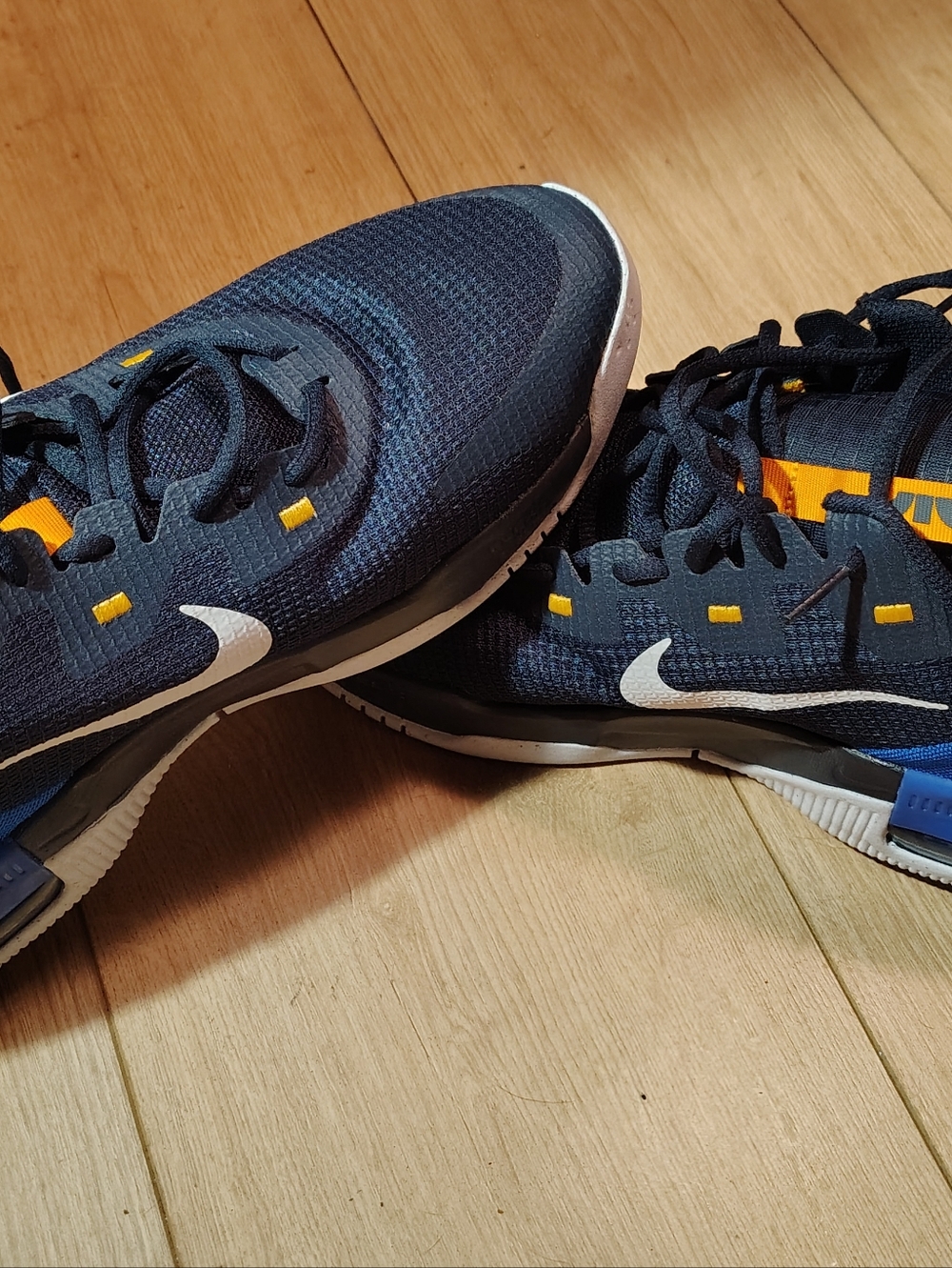 Nike Dark Blue Air Max Alpha Running Shoes with White Swoosh and Yellow Accents